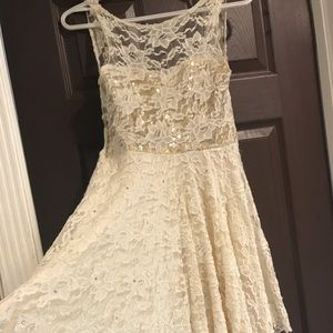 Cream color elegant lace dress with rhinestones.
